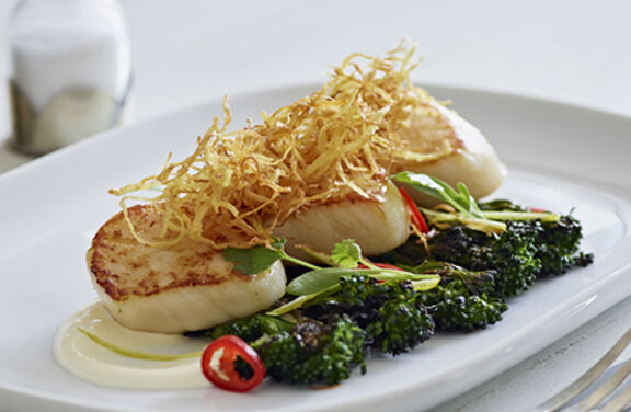 Seared Scallops with Crème Fraiché, Grilled Tender Stem Broccoli, Chilli and Fried Ginger
